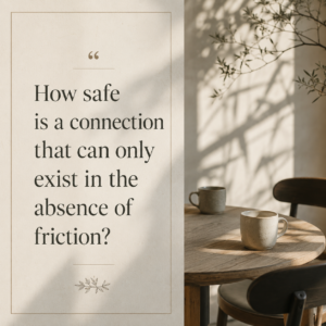 Quote graphic reading, “How safe is a connection that can only exist in the absence of friction?” beside two coffee cups at a table.